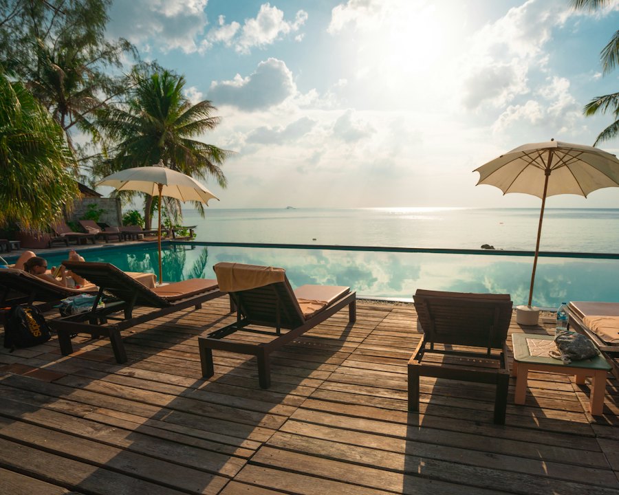 Sun loungers on a terrace above the sea